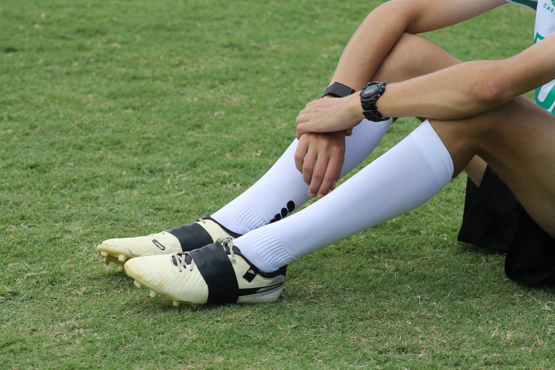 boot lace covers, shin guard straps, silicone straps, football shin guards, football lace covers.