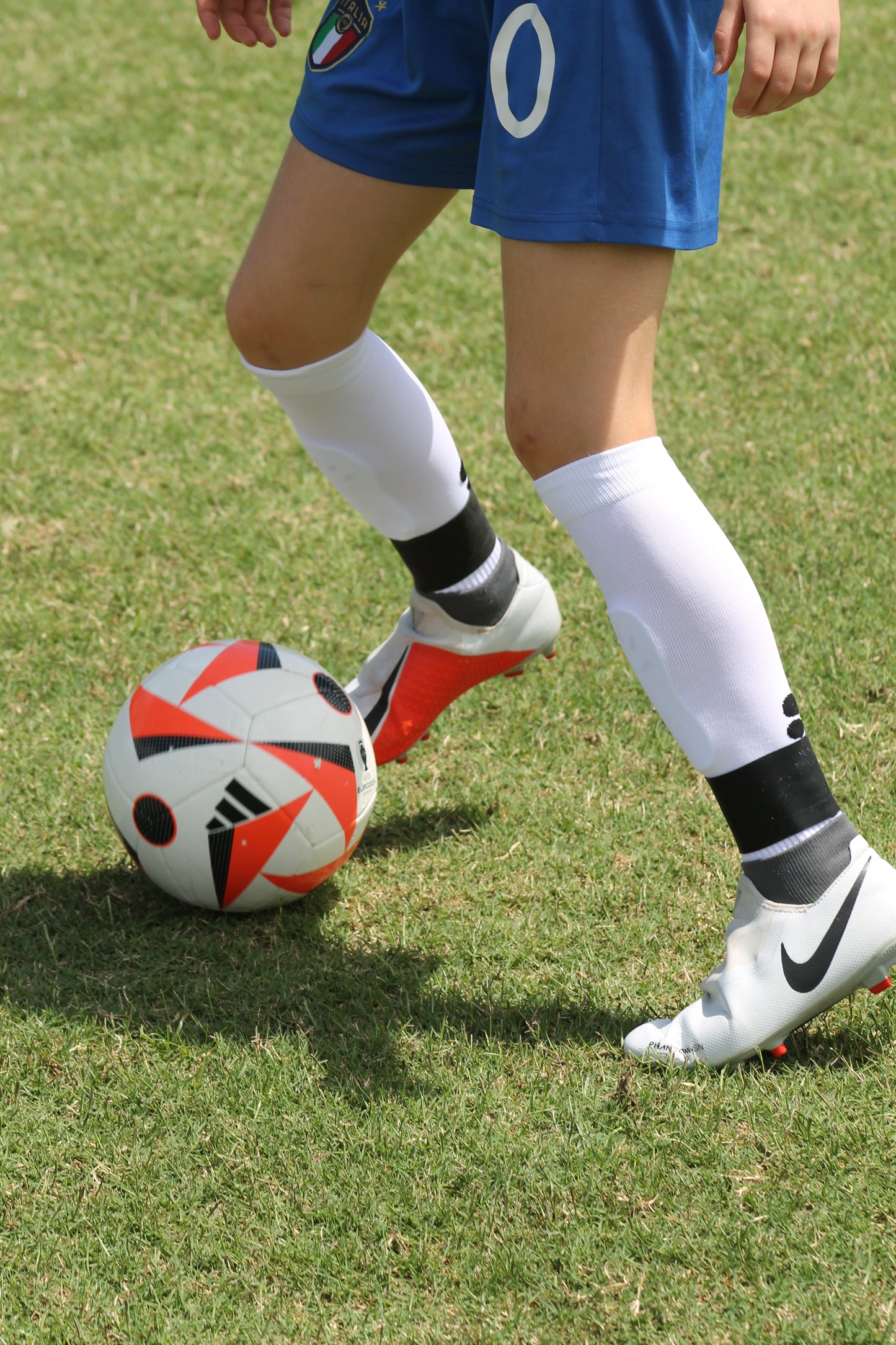boot lace covers, shin guard straps, silicone straps, football shin guards, football lace covers.