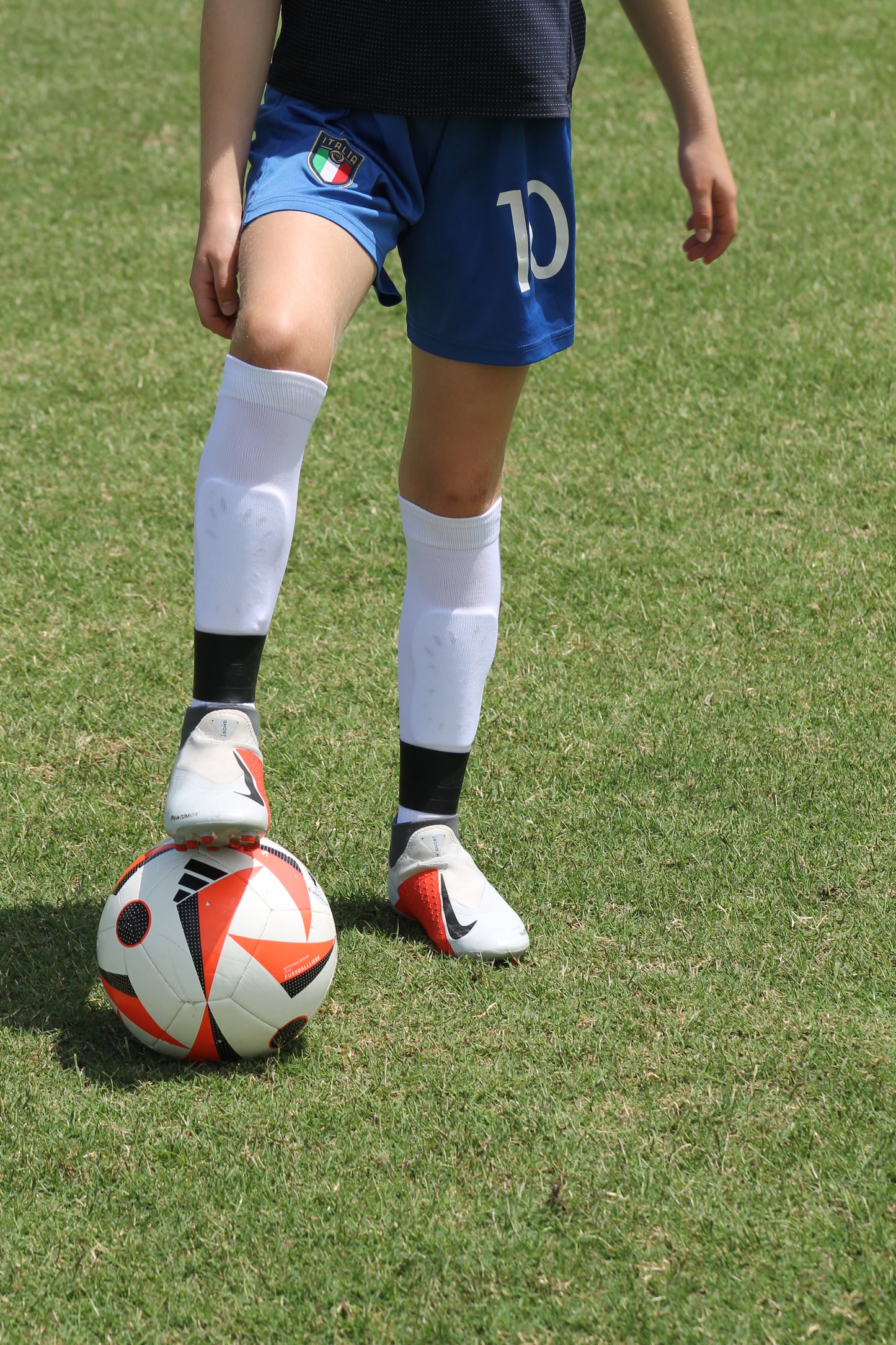 boot lace covers, shin guard straps, silicone straps, football shin guards, football lace covers.