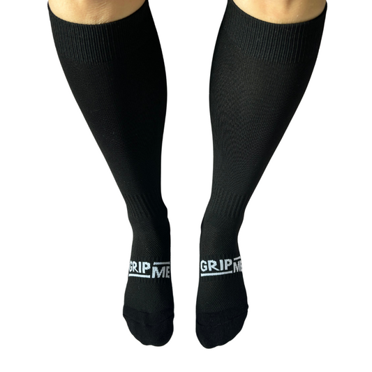 black knee high football soccer grip socks. Premium grip socks, futsal socks, anti-slip grip, below knee, long football socks.